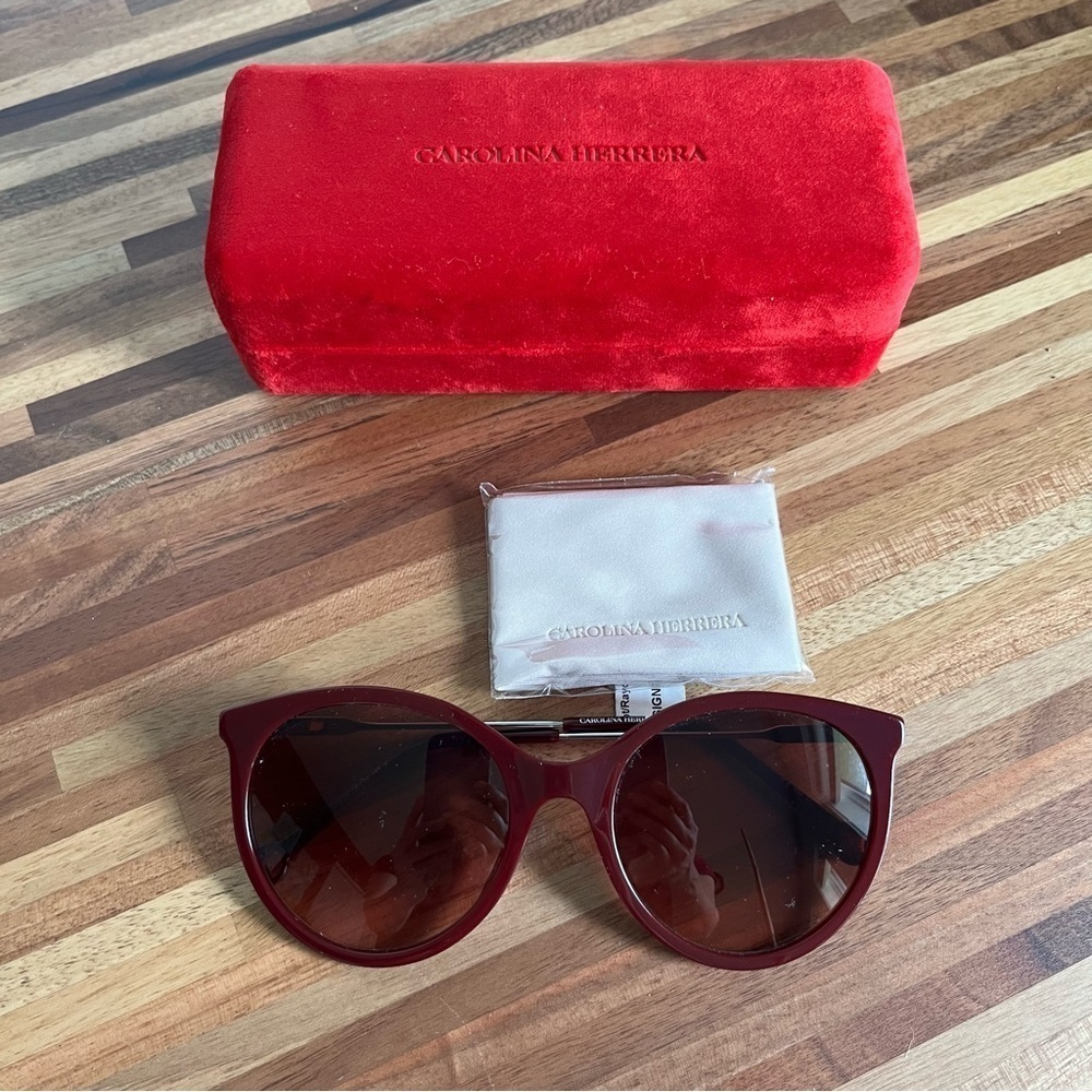 NWT Carolina Herrera Burgundy rimmed Sunglasses with case